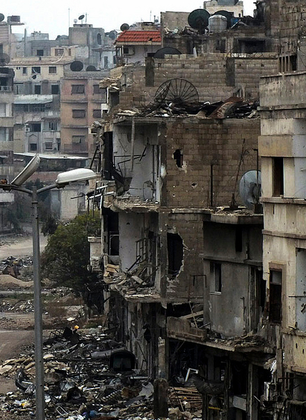 Beschadigde gebouwen in Homs. Foto: Reuters/Yazan Homsy